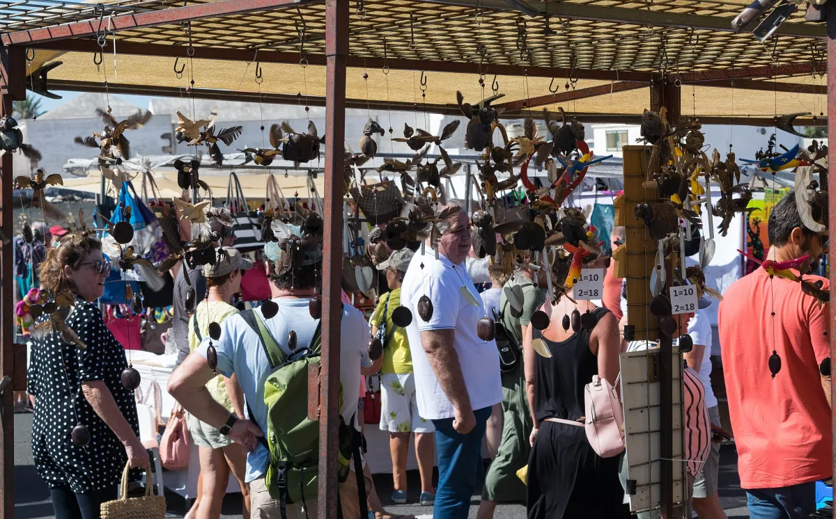 Craft stalls and visitors at the Sunday market in Villa de Teguise, Lanzarote.